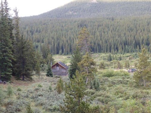 GDMBR: We had ridden almost to the turn-back. That cabin is a National Forest rental.